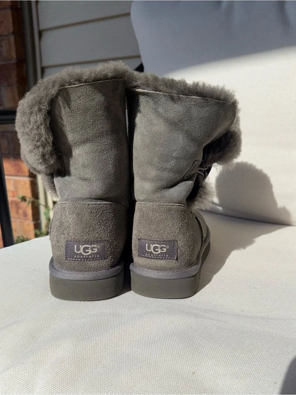 Women's Short Sheepskin Bailey Button Ugg Winter Boots in Gray